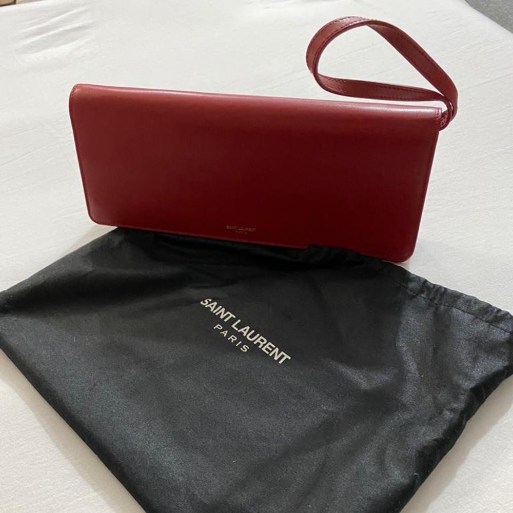 Red SAINT LAURENT Paris Wristlet 
Like new